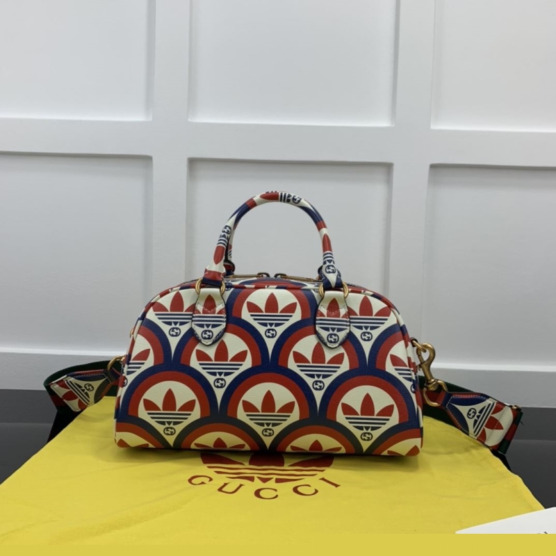 G*u*i top handle bags